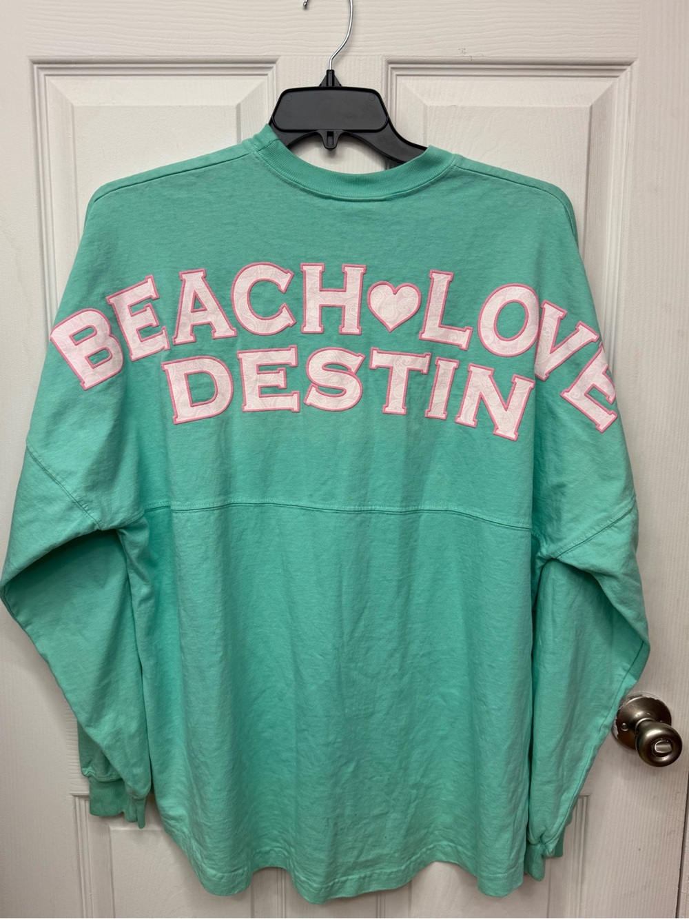 Spirit Mint Green Crewneck with Purple Graphic Tag